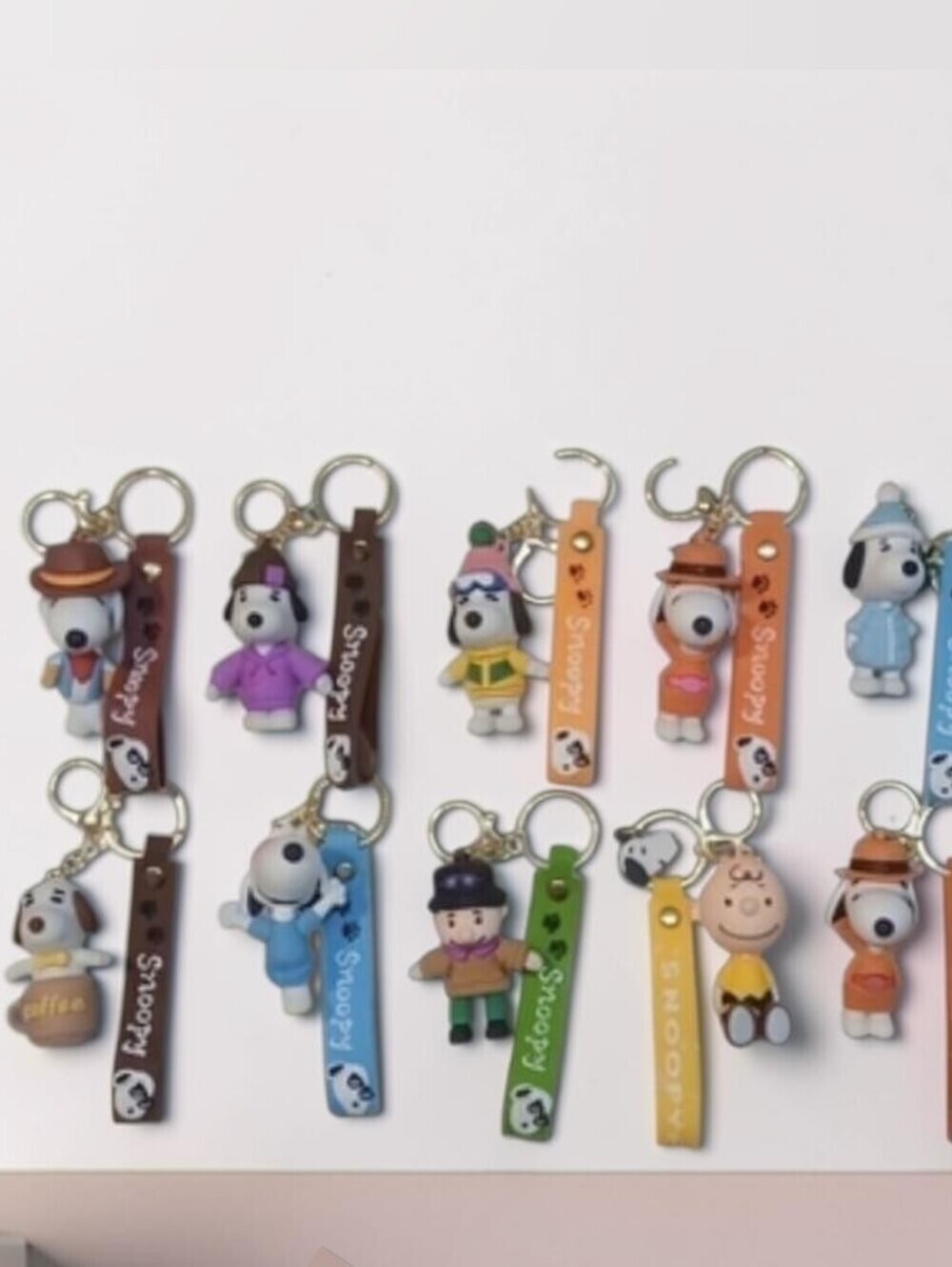 Peanuts -1 Snoopy Silicone Keychain,Lobster Clasp Avg Figure 3in ht.Over-All 9in